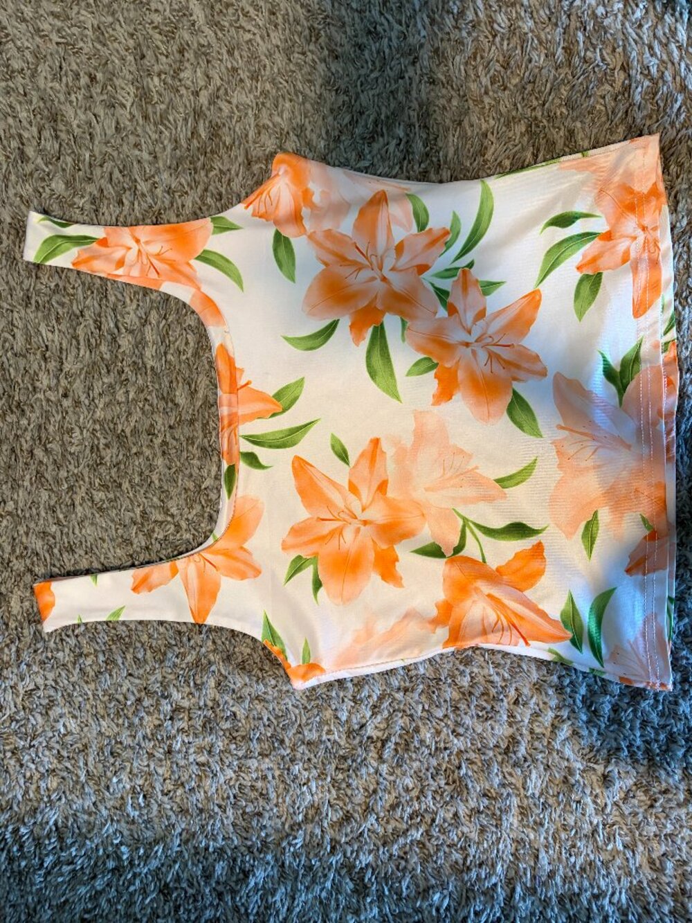Stand out this summer in this medium-sized, chic Shein crop top with bold orange